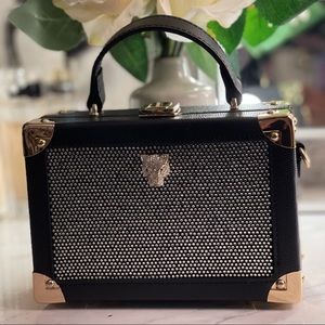Black diamond sparkled trunk bag w/ Jaguar logo.